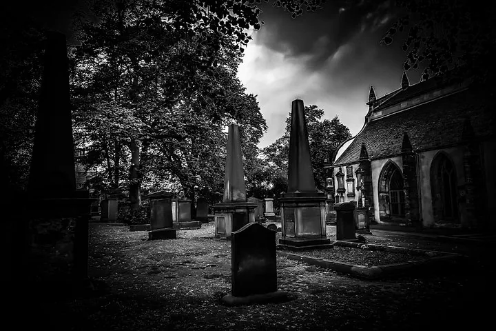 Black and white view of Greyfriars Kirkyard with tombstones.